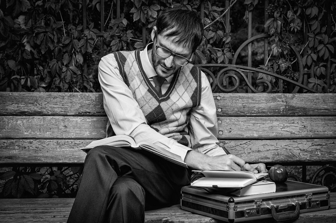 detective reading case files
